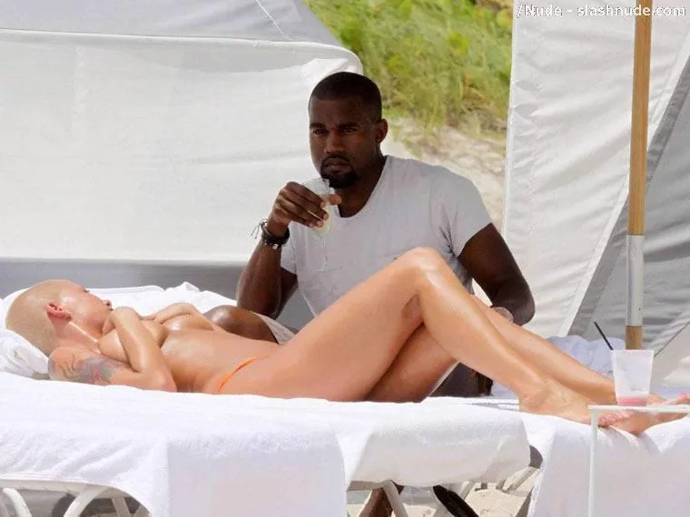Amber Rose no top with Kanye West