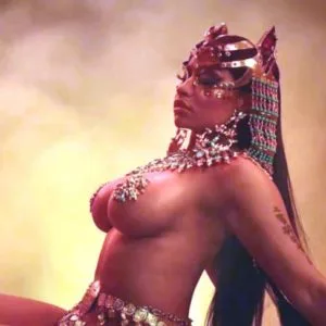 Nicki Minaj fake breasts exposed